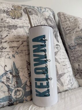 White Tumbler with Teal Blue Logo and Stainless Straw